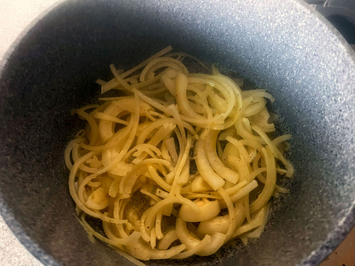 Sliced onoins in a saucepan