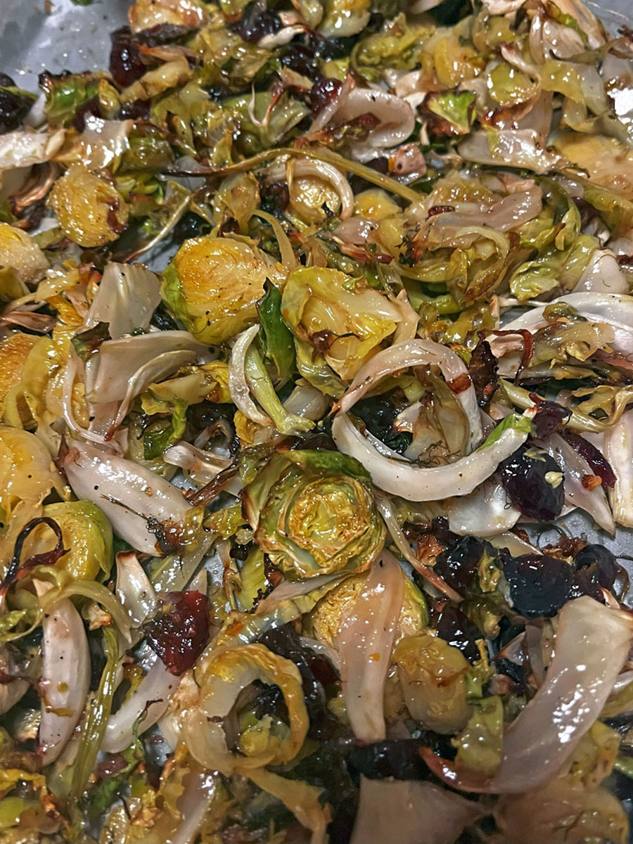 above shot of finished salad laid out on baking tray, looking glossy